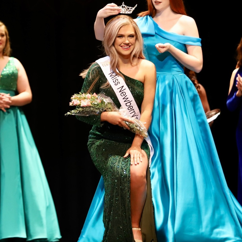 Mia Bella Couture Hunter Green one shoulder gown. Fully beaded.